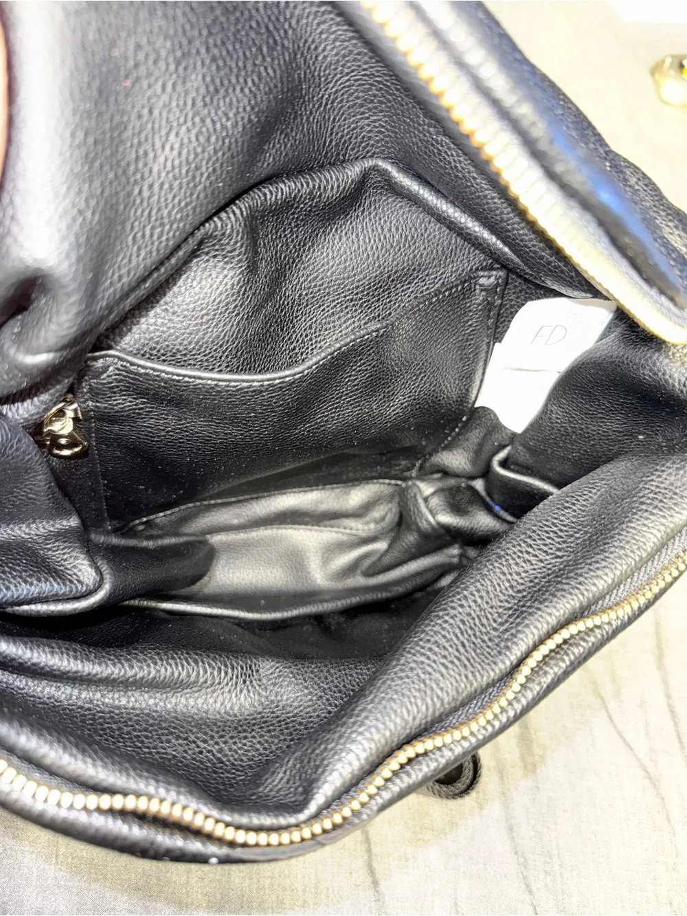 Fawn Design Black Pebbled Leather Backpack with Gold Hardware
